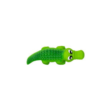 Bright green squeaky dog toy shaped like a friendly crocodile with a textured body and large, expressive eyes.