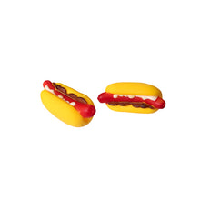 Bright yellow hotdog toy featuring red sausage and brown accents, designed with squeakers for playful dogs.